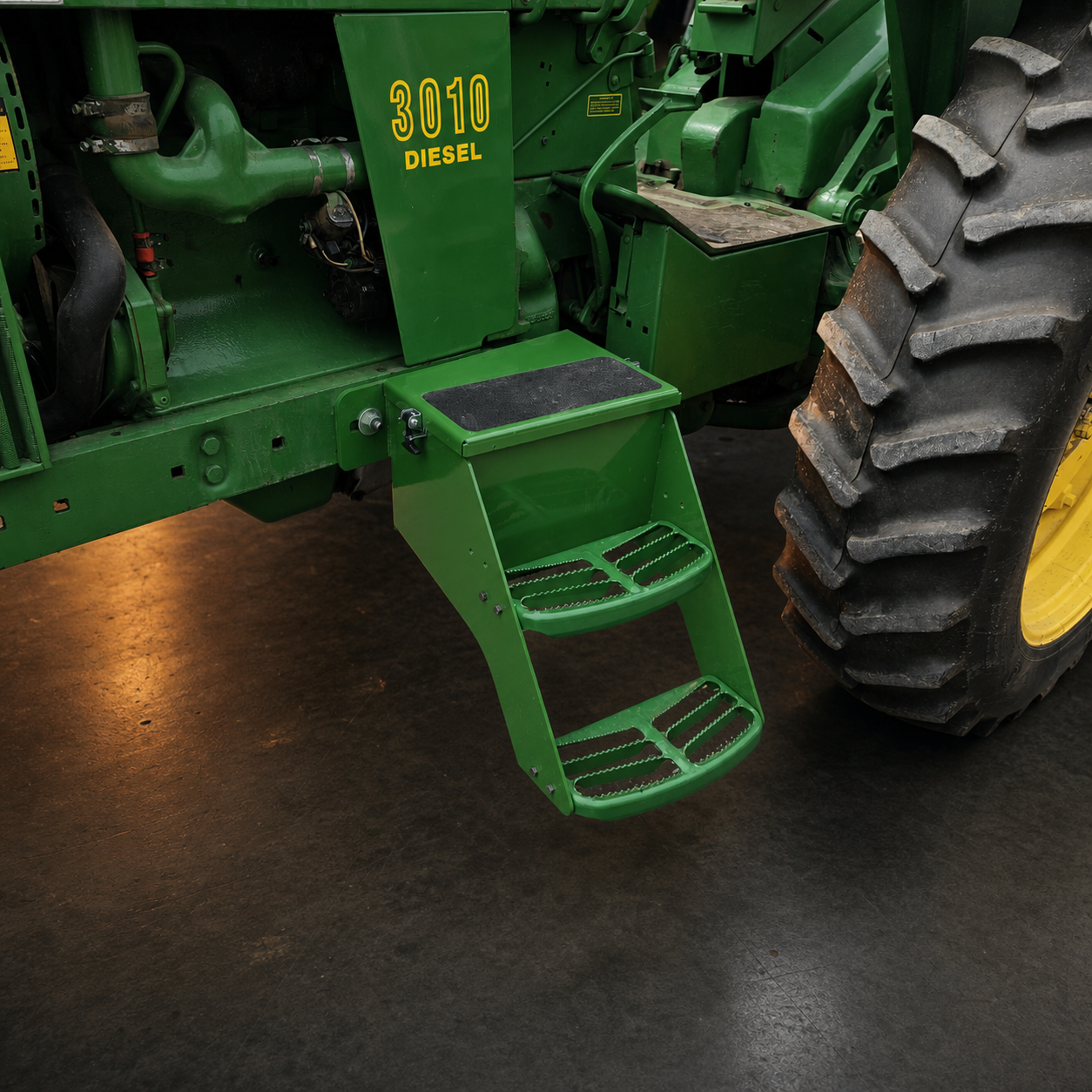 Actual P-Fab battery-box step installed on a John Deere tractor